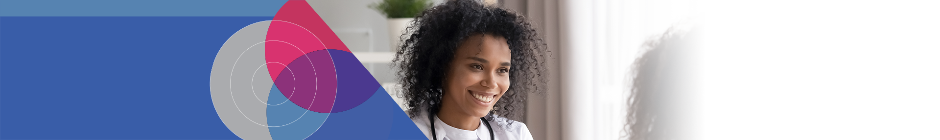 Female doctor smiling and looking away from the camera