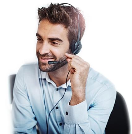Professional man smiling and speaking into a headset